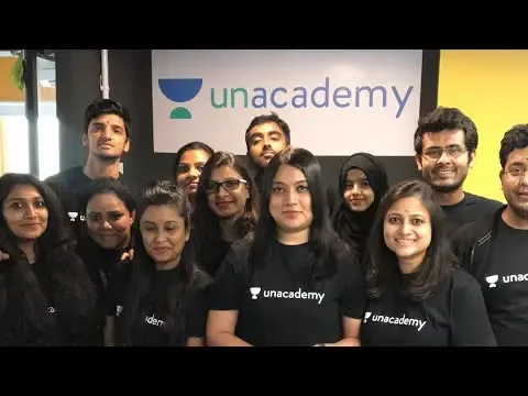 Students gathered outside working on a creative art project.